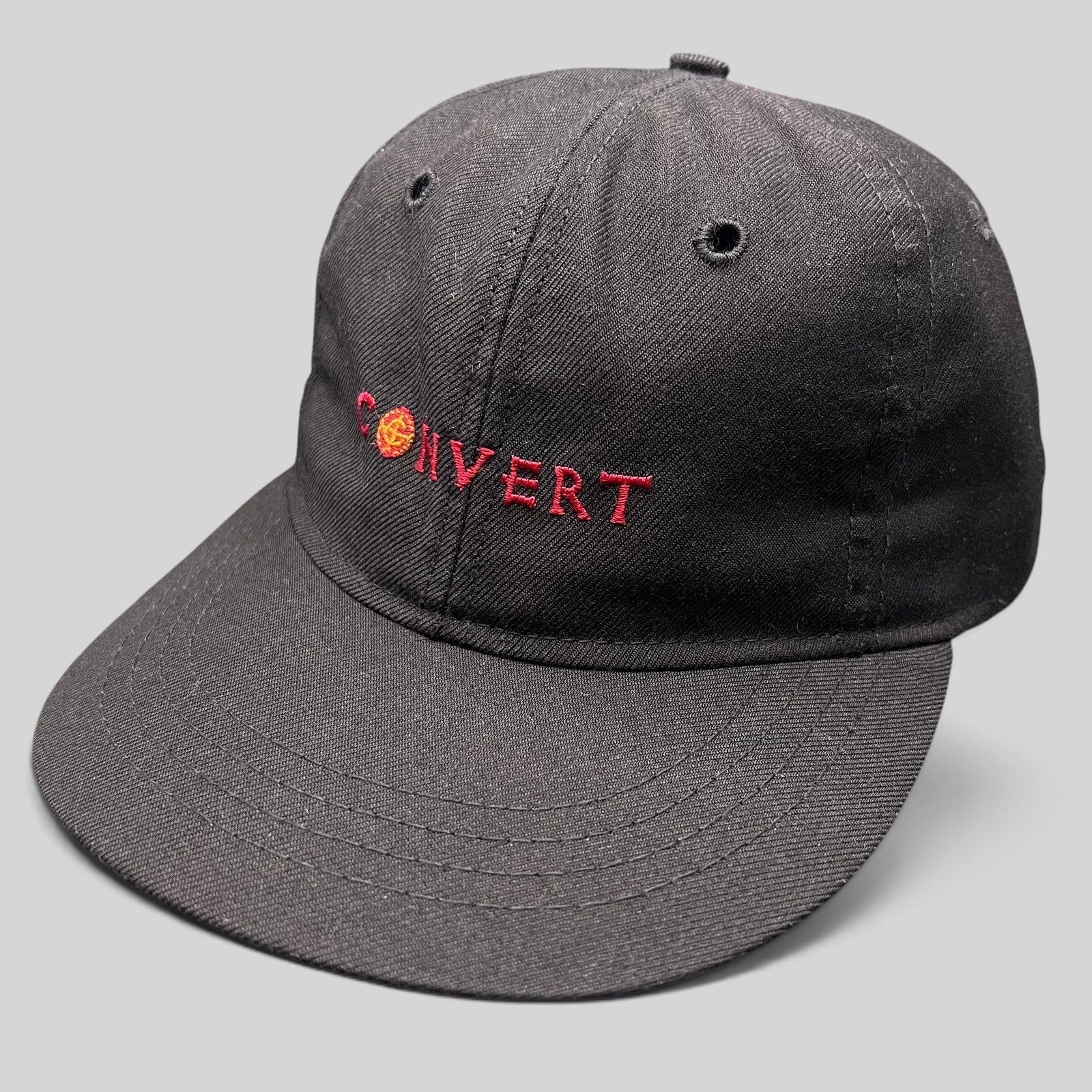 Raree Finds vintage black Columbia Sportswear snapback hat with red embroidered CONVERT spellout and cross emblem.
