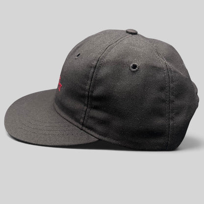 Raree Finds vintage black Columbia snapback hat with red CONVERT embroidery and flat bill, side profile view.