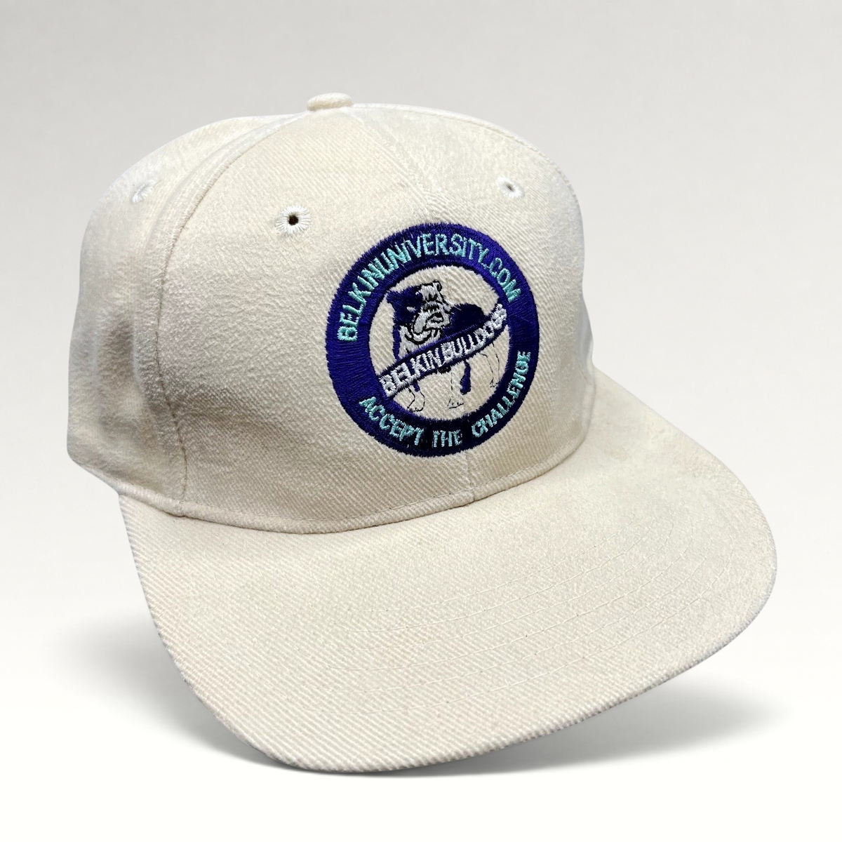 Raree Finds vintage cream cotton strapback hat with embroidered Belkin University Bulldogs mascot and slogan logo