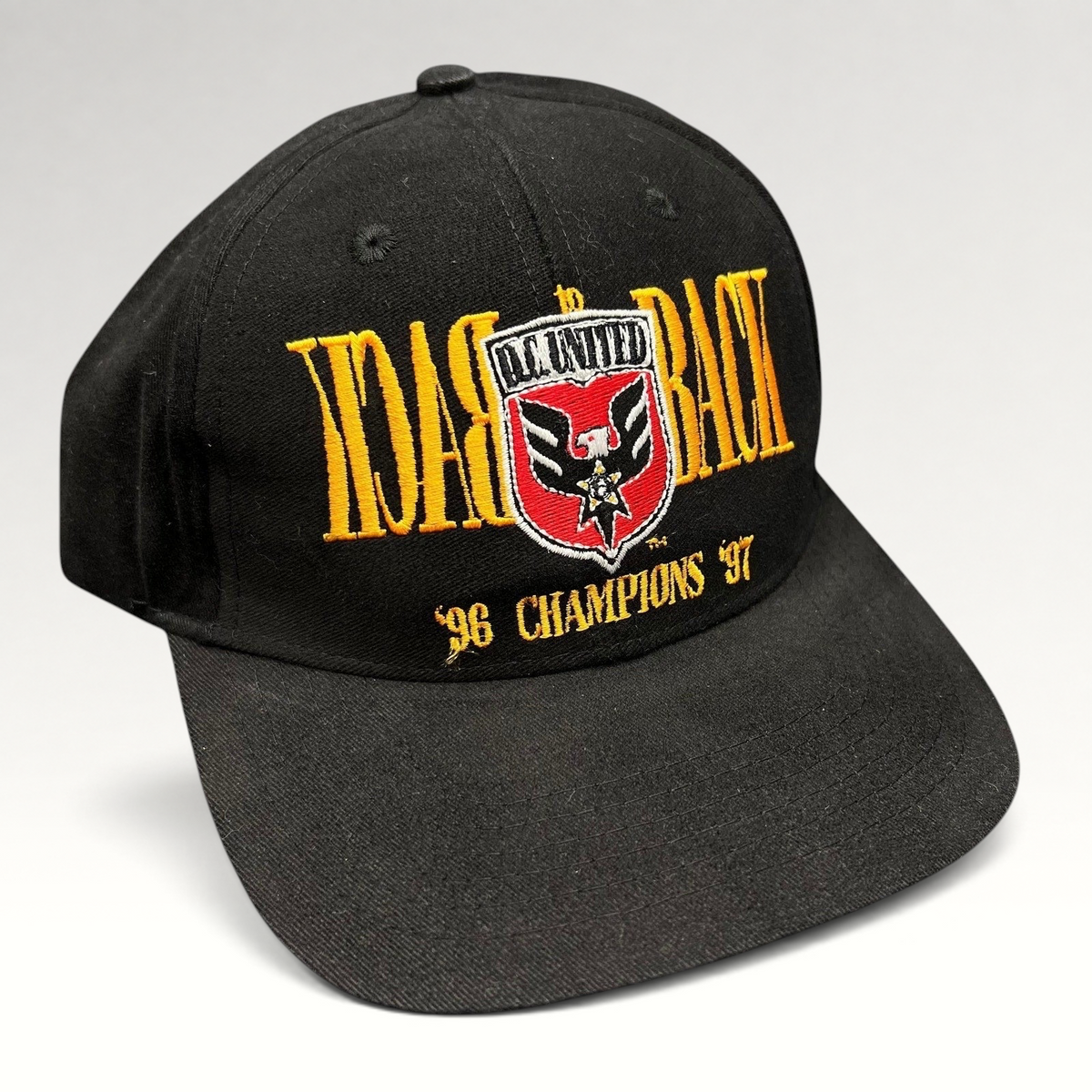 Raree Finds vintage black DC United snapback hat with embroidered 1996-1997 back-to-back MLS champions graphic