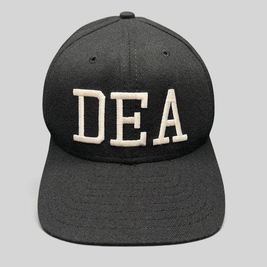 Raree Finds vintage black New Era DEA strapback hat with white raised embroidery, made in USA law enforcement cap.