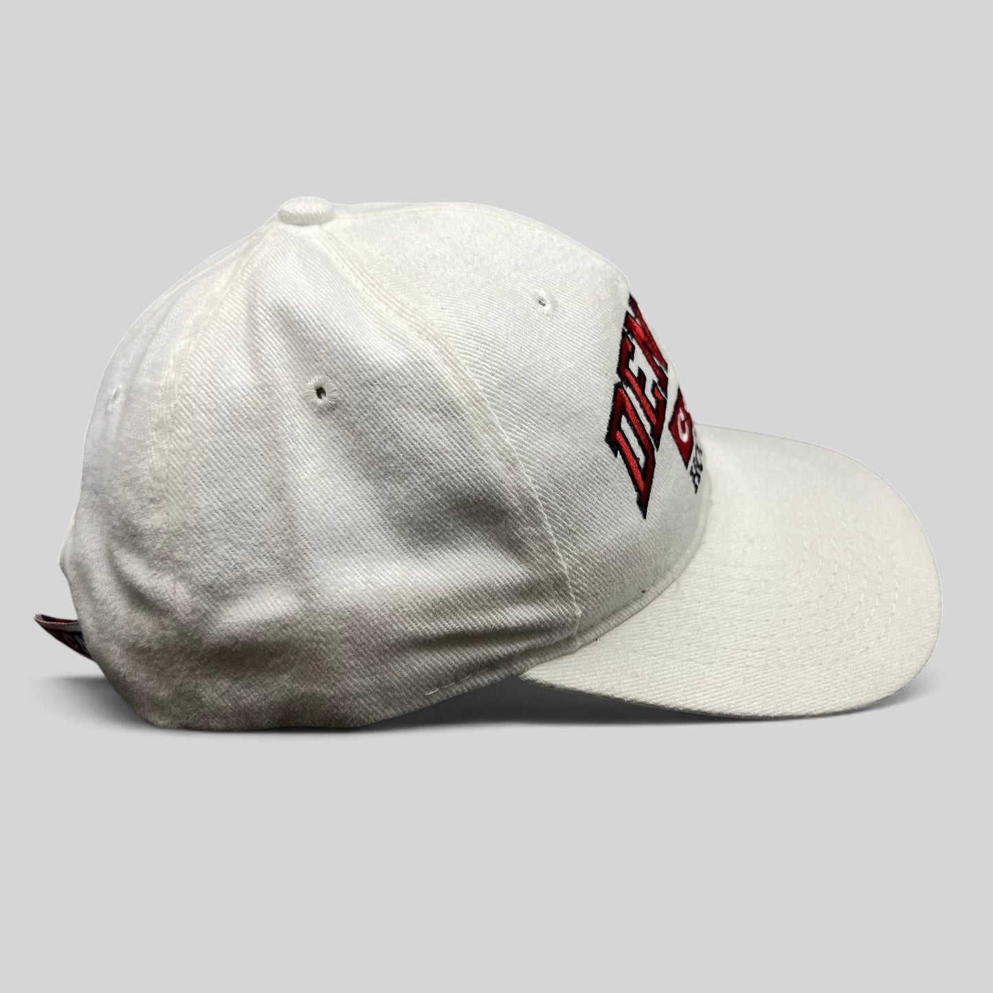 Raree Finds vintage white Denver Hockey CCM snapback hat made of cotton with embroidered logo and snap closure