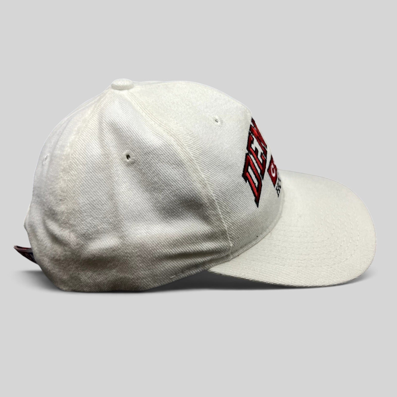 Raree Finds vintage white Denver Hockey CCM snapback hat made of cotton with embroidered logo and snap closure