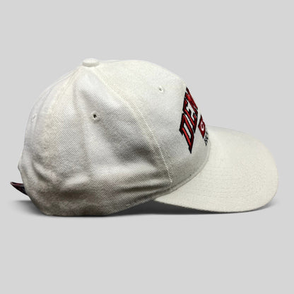 Raree Finds vintage white Denver Hockey CCM snapback hat made of cotton with embroidered logo and snap closure