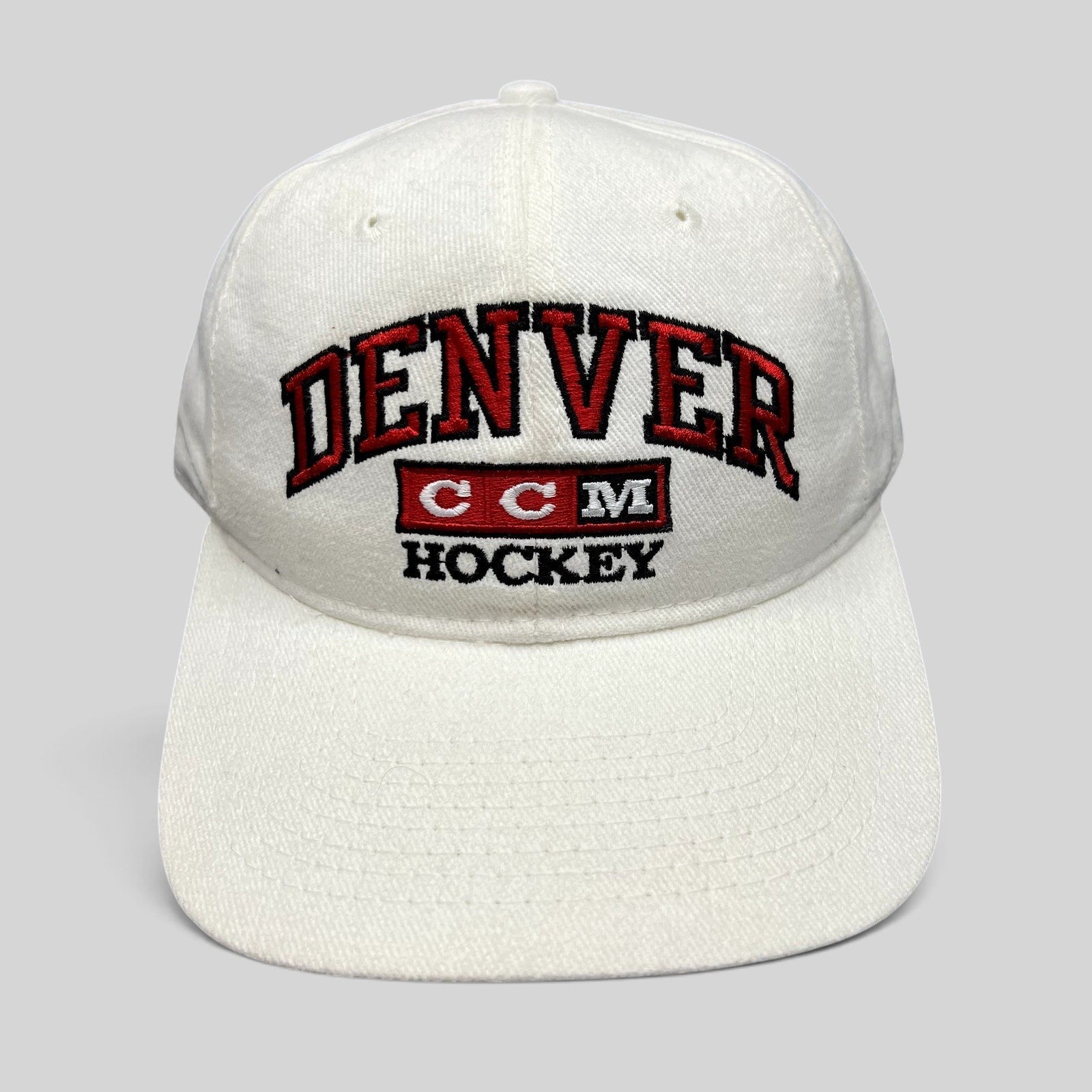 Raree Finds vintage white cotton Denver Hockey snapback hat with red and black embroidered CCM logo