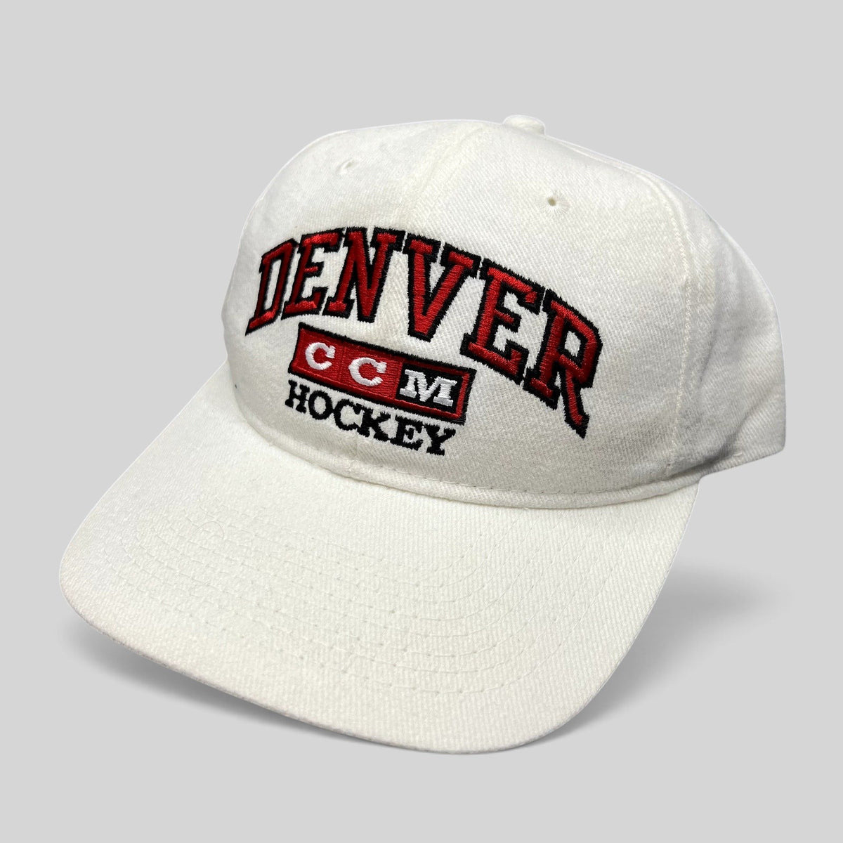 Raree Finds vintage white cotton Denver Hockey snapback hat with red and black embroidered CCM logo