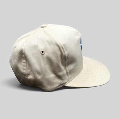 Raree Finds vintage Y2K Earth Day 2000 white snapback hat with Save The Environment graphic and adjustable closure