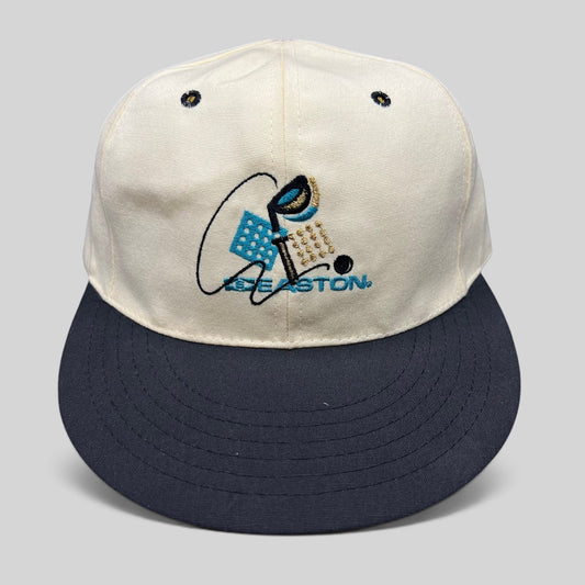 Raree Finds vintage Easton golf hat with white crown, navy brim, and embroidered club graphic on a Pro 98 fitted cap.