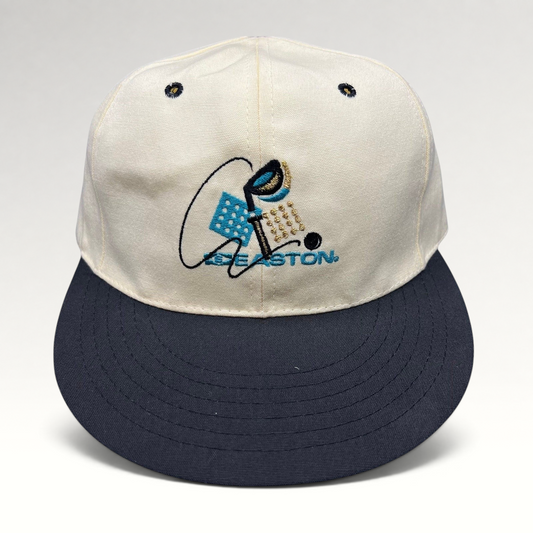 Raree Finds vintage Easton golf hat with white crown, navy brim, and embroidered club graphic on a Pro 98 fitted cap.