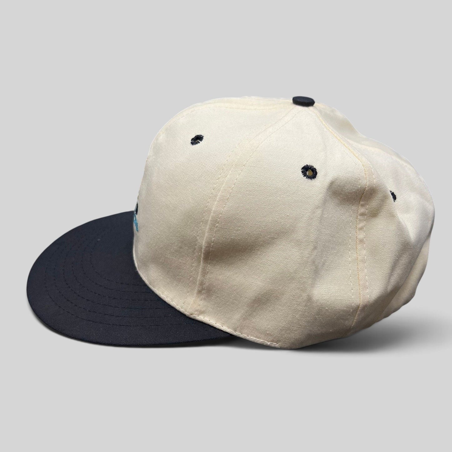 Raree Finds vintage 90s Easton fitted golf hat with white crown, navy brim, and embroidered club graphic