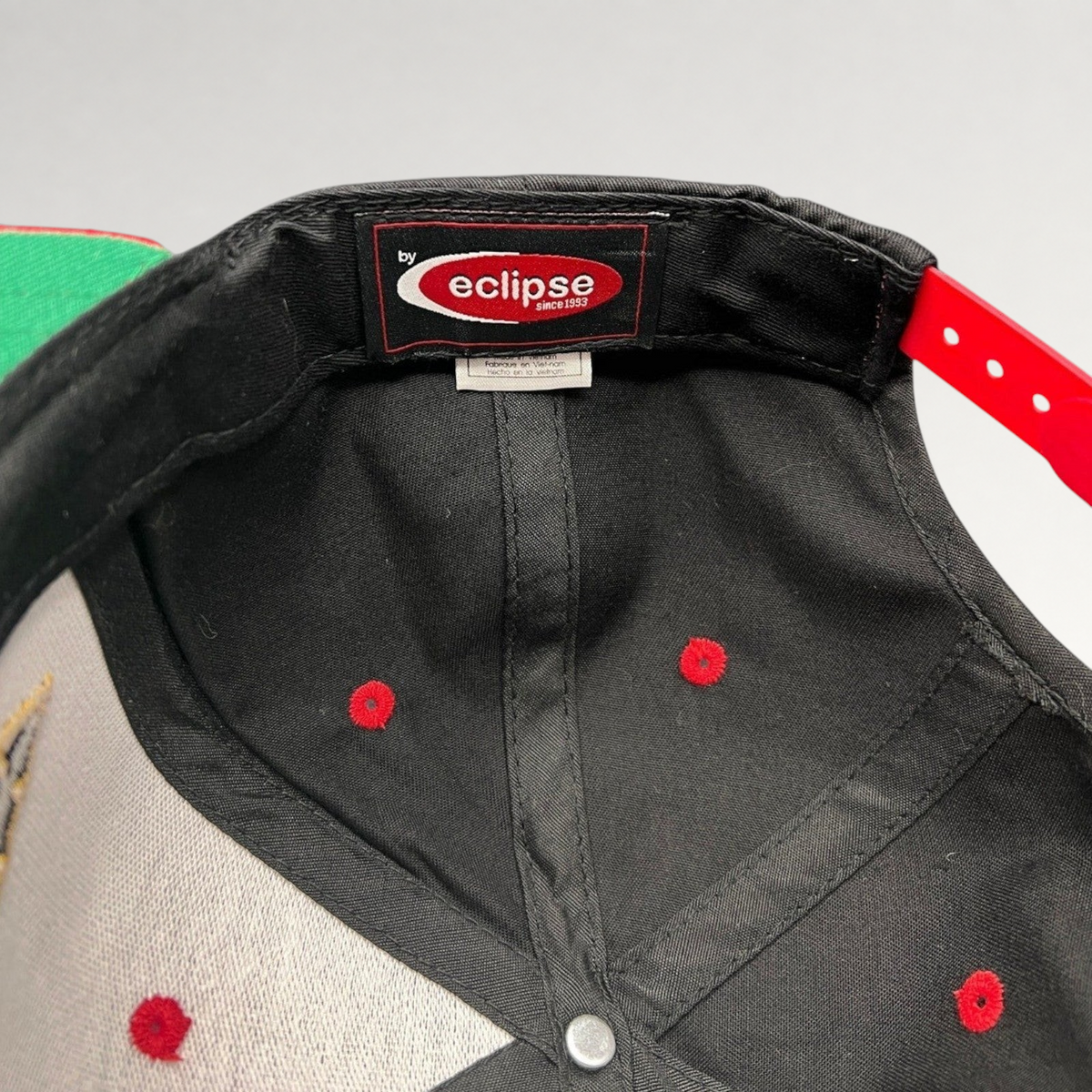 Raree Finds vintage Eclipse San Diego State Aztecs snapback hat interior showing brand label and red snap closure