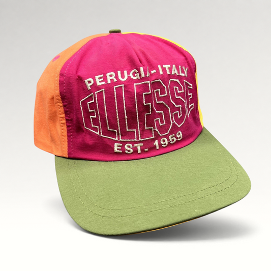 Raree Finds vintage 90s Ellesse snapback hat in multicolor nylon with Perugia Italy embroidery and colorblock panels