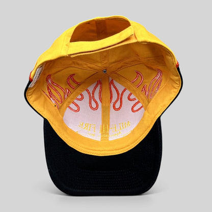 Raree Finds vintage Mile-Hi Fire Apparatus strapback hat with yellow crown, black brim, and embroidered flame design.