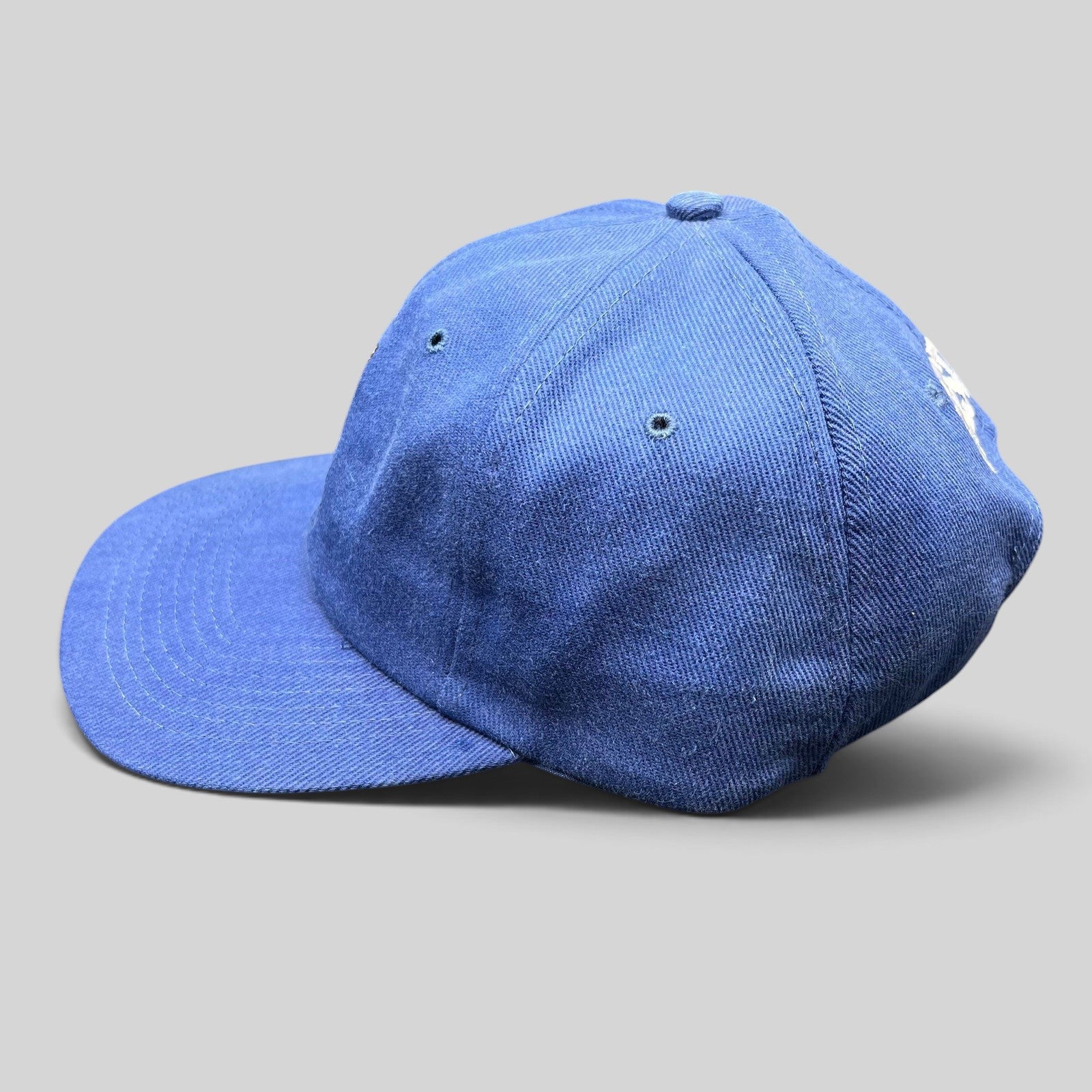 Raree Finds vintage 1998 Firestorm movie cast and crew royal blue strapback hat with embroidered flaming eagle detail