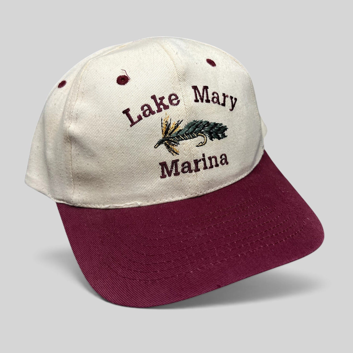 Raree Finds vintage cream and burgundy snapback hat with embroidered Lake Mary Marina fishing fly lure design