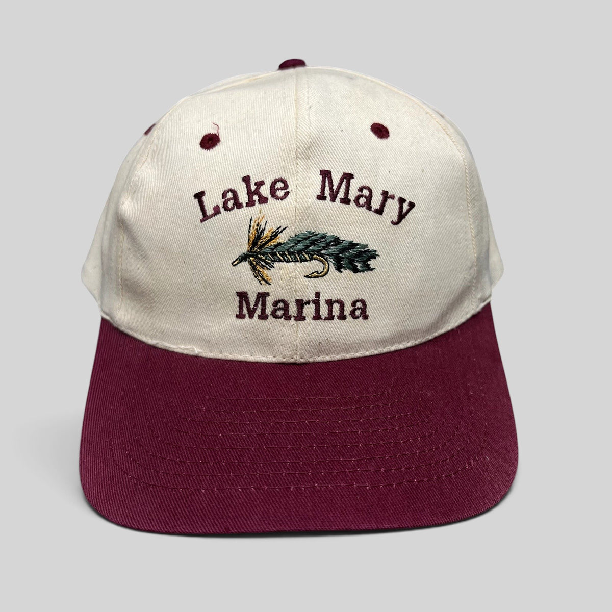Raree Finds vintage cream and burgundy snapback hat featuring an embroidered Lake Mary Marina fishing fly lure design.