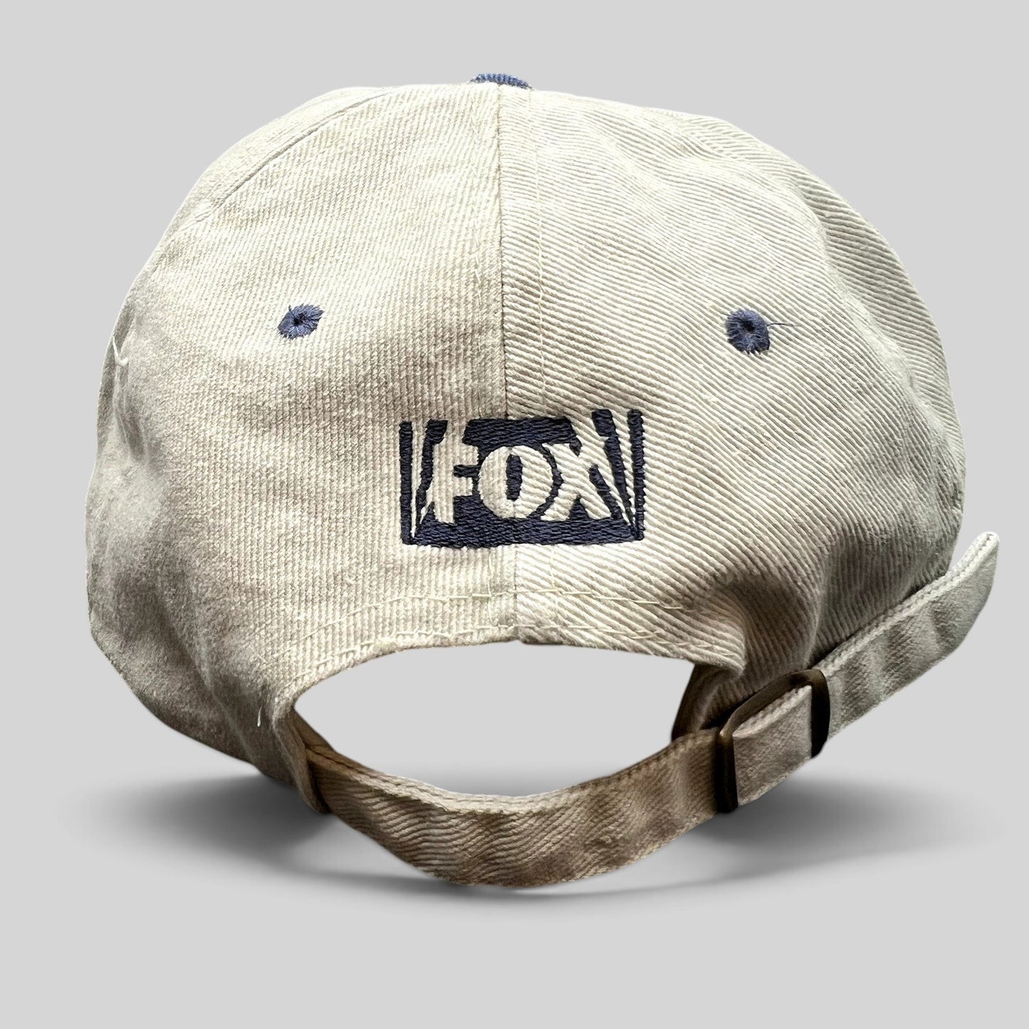 Raree Finds vintage Melrose Place FOX TV show strapback hat in cream with navy embroidered logo and brass buckle