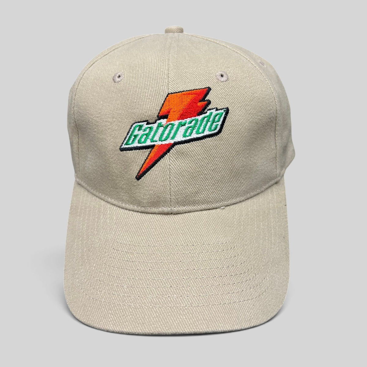 Raree Finds vintage beige cotton strapback hat with embroidered orange and green Gatorade lightning bolt logo