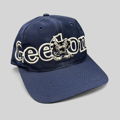 Raree Finds vintage navy Geelong AFL snapback hat with white embroidered spellout and team mascot logo