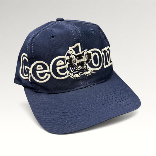 Raree Finds vintage navy Geelong AFL snapback hat with white embroidered spellout and team mascot logo