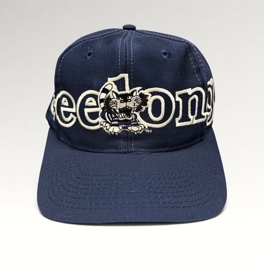 Raree Finds vintage navy Geelong AFL snapback hat with white embroidered spellout and team mascot on front panel