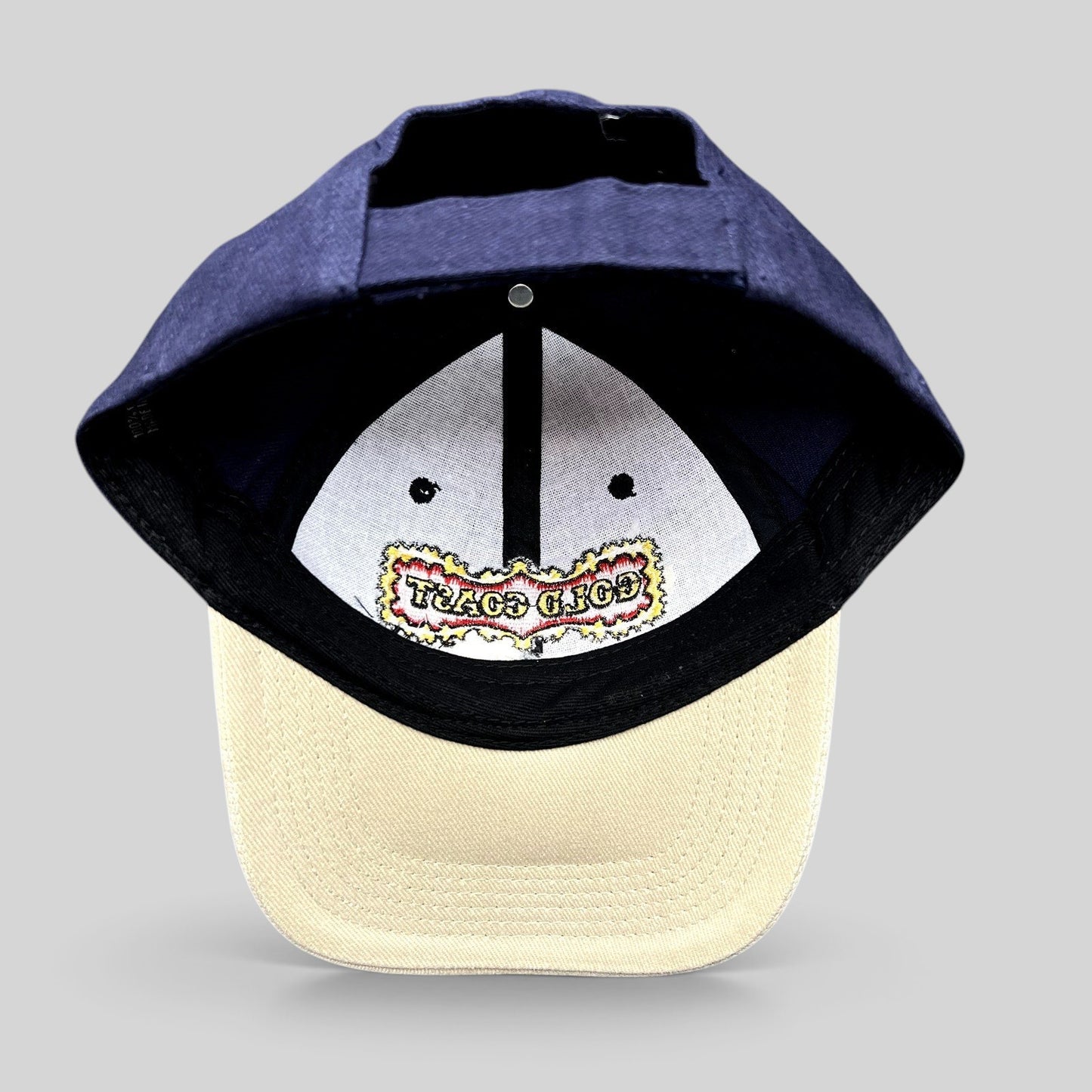 Raree Finds vintage 90s Gold Coast Casino poker room strapback hat with navy crown, tan brim, and embroidered logo