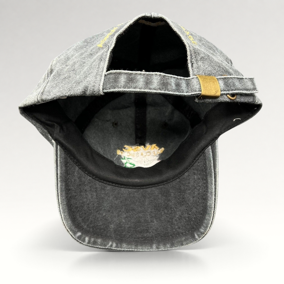Raree Finds vintage 1998 AVSC Golf Classic Cobra strapback hat in faded black cotton with a brass buckle closure.