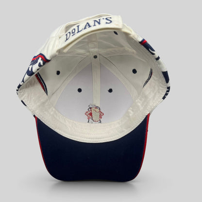 Raree Finds 2004 Desperado Golf Classic strapback hat featuring interior Dolans embroidery and white cotton crown