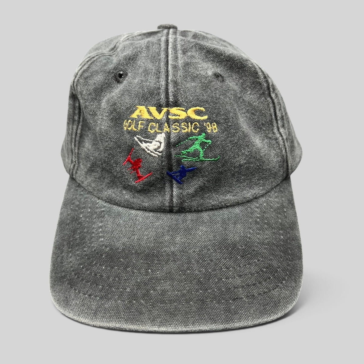 Raree Finds vintage 1998 AVSC Golf Classic dad hat in washed black cotton with multi-color embroidered golfer graphics.