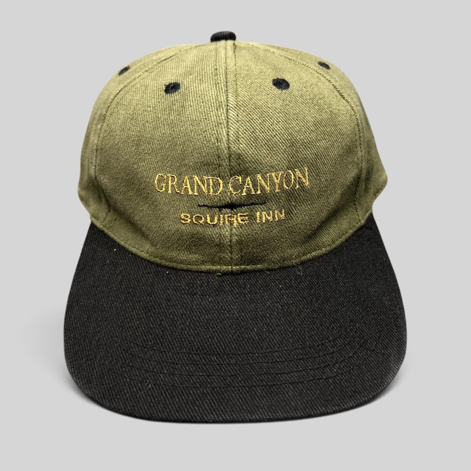 Raree Finds vintage olive green and black cotton strapback hat with Grand Canyon Squire Inn embroidered front text