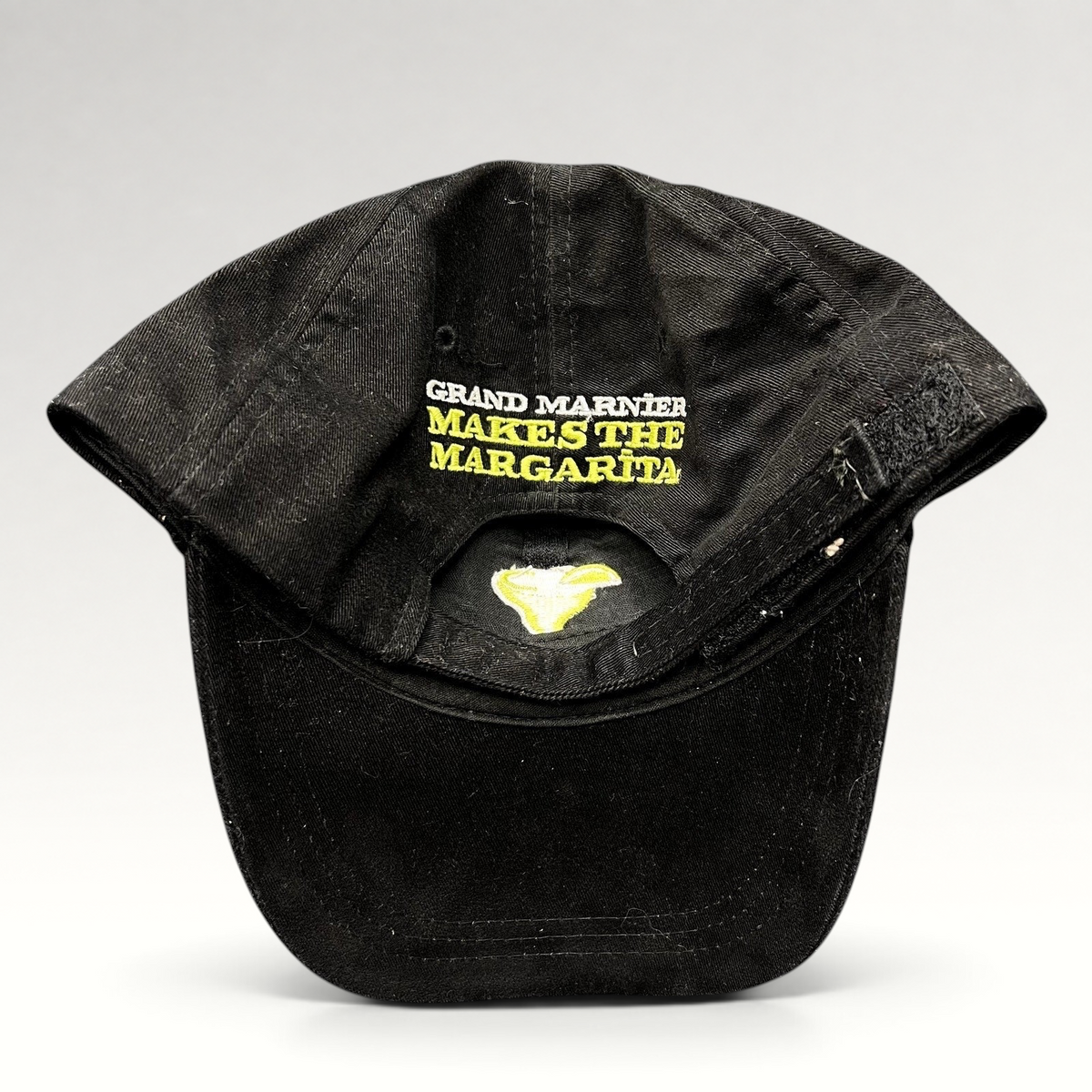 Raree Finds vintage black cotton strapback hat with Grand Marnier Makes the Margarita embroidery on the back