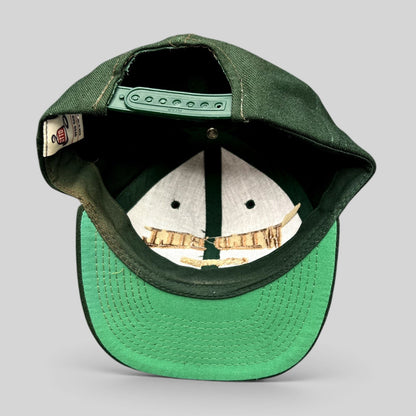 Raree Finds vintage dark green Otto Cap snapback hat with interior view showing structured crown and green undervisor