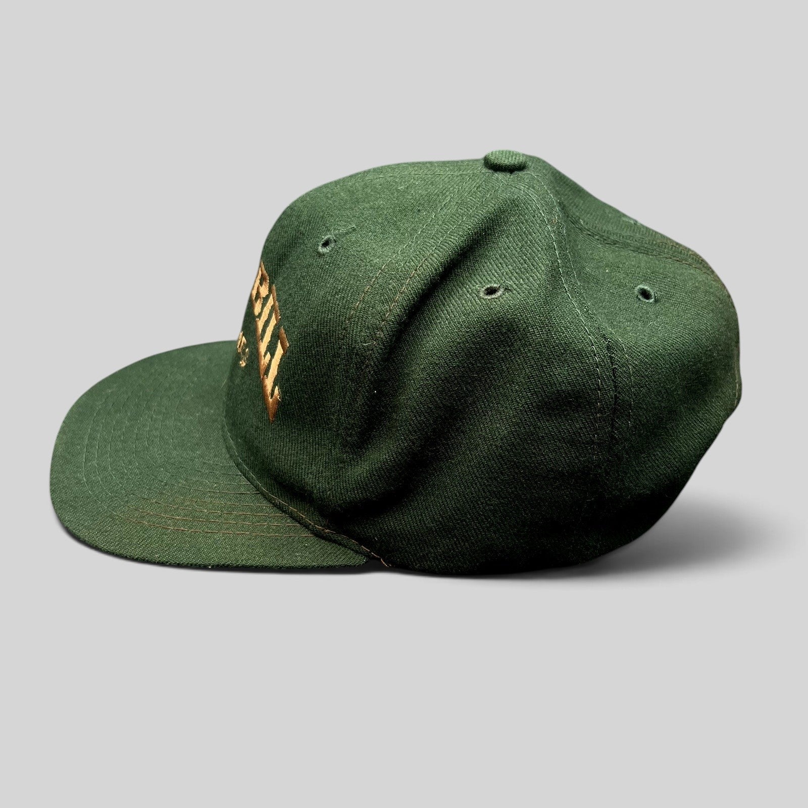 Raree Finds vintage dark green Otto Cap snapback hat with Wild Bill Costumes embroidery and flat brim