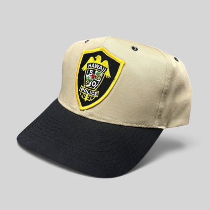 Raree Finds vintage Nissin Hawaii 5-0 police snapback hat in khaki and black cotton with embroidered badge logo.