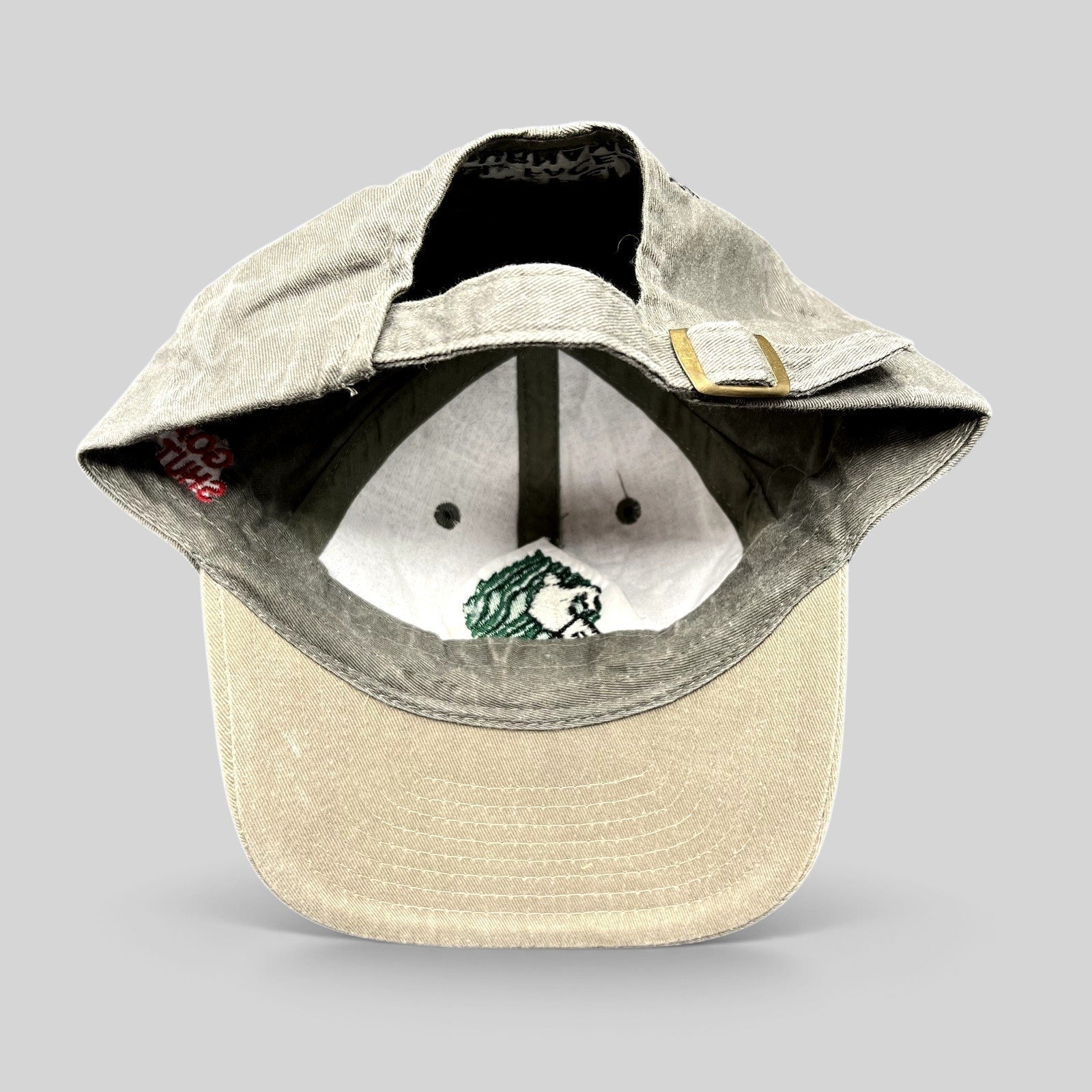 Raree Finds vintage Aspen Fall Face Off hockey strapback hat with olive gray crown, khaki brim, and brass buckle.