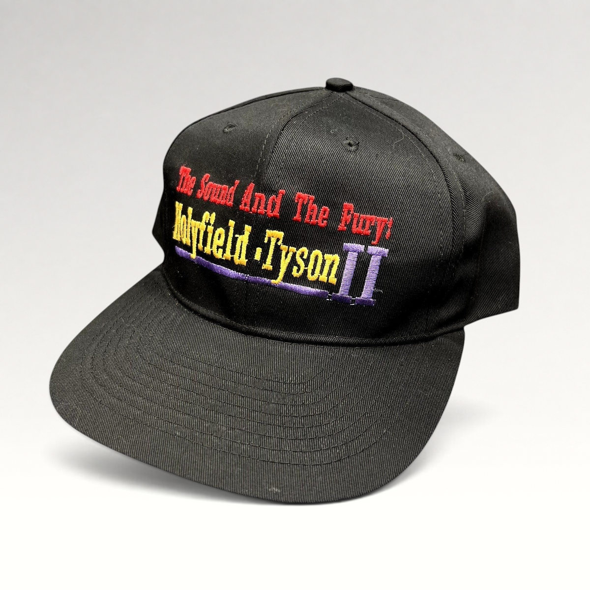 Raree Finds vintage 1997 Holyfield vs Tyson II boxing snapback hat with embroidered The Sound And The Fury slogan