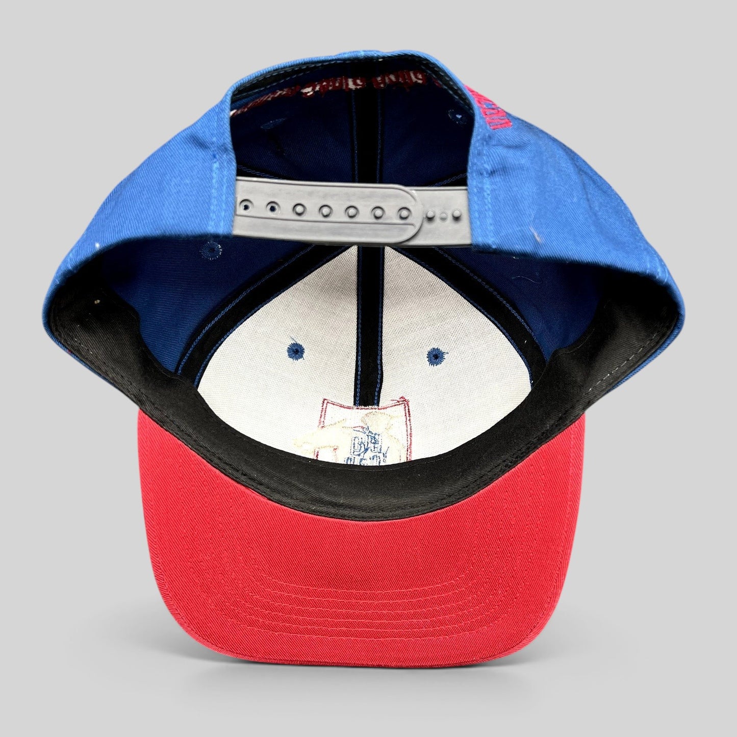 Raree Finds vintage 2000 Big Cap Santa Anita horse racing snapback hat with navy crown, red brim, and adjustable strap