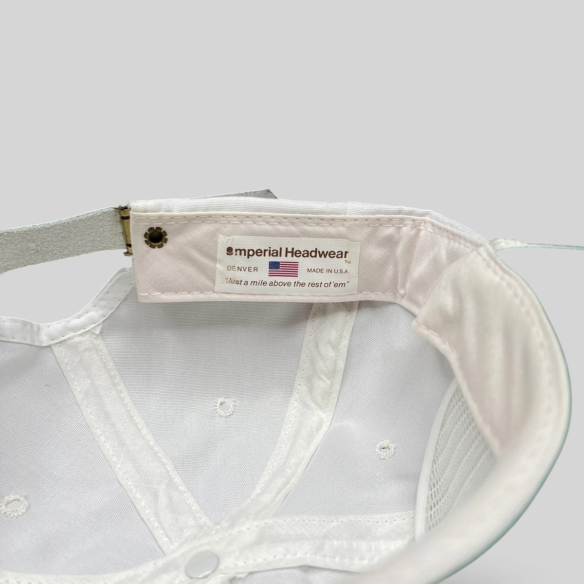 Raree Finds vintage Imperial Headwear cap interior label showing USA made construction and leather strapback detail