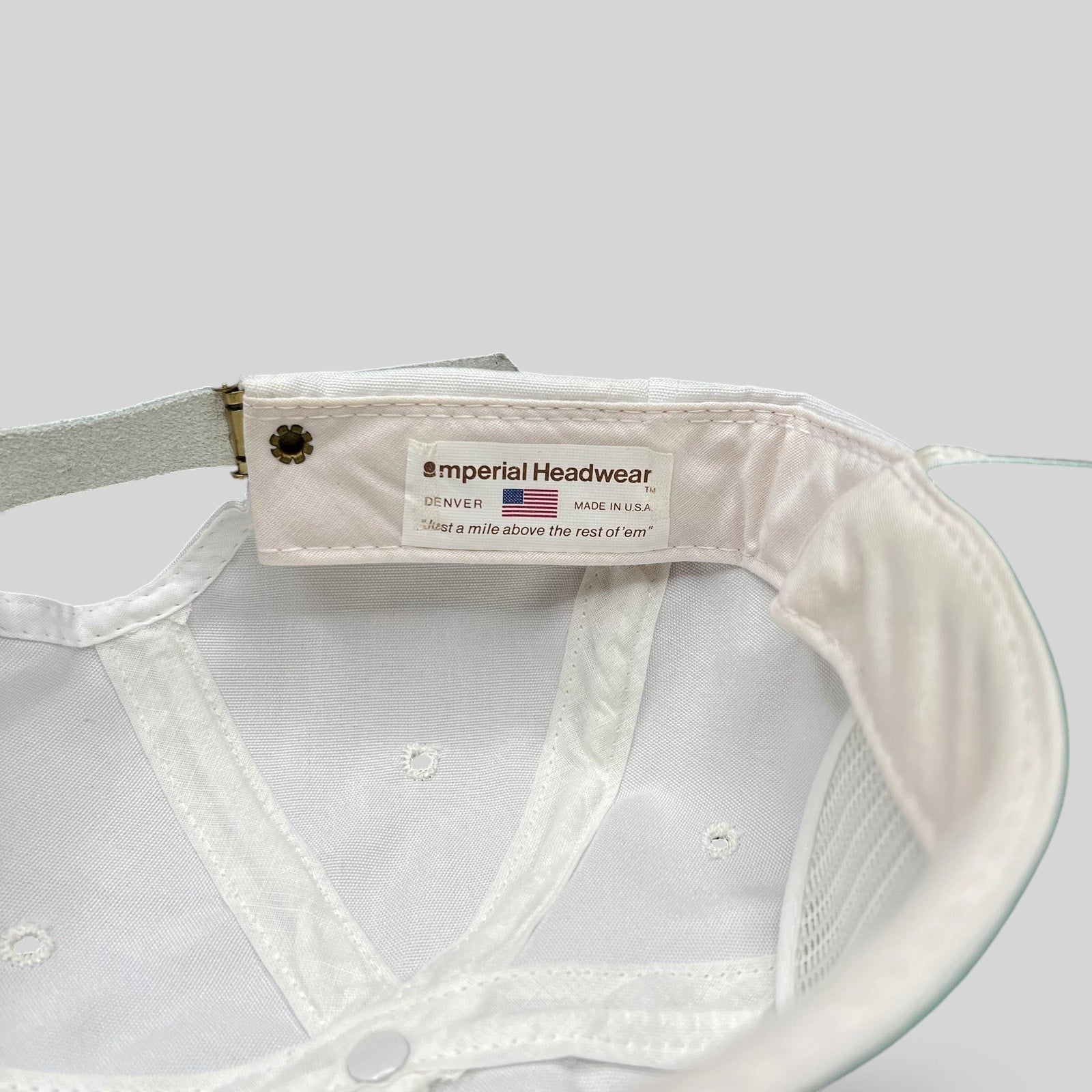 Raree Finds vintage Imperial Headwear cap interior label showing USA made construction and leather strapback detail