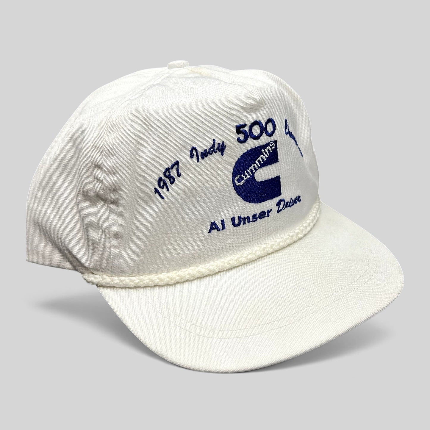 Raree Finds vintage 1987 Indy 500 Cummins Diesel white rope hat with blue embroidery and leather strapback closure.