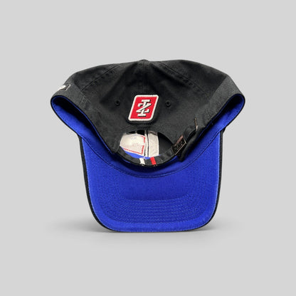 Raree Finds vintage IZOD IndyCar Series cotton strapback hat with a black crown, blue brim, and embroidered logo.