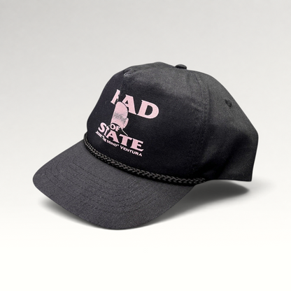 Raree Finds vintage black cotton twill snapback with pink Head of State Jesse Ventura graphic and black rope trim
