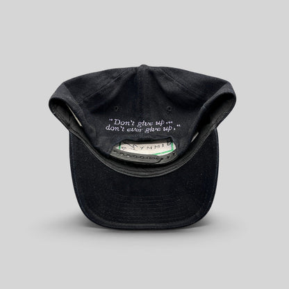 Raree Finds vintage black cotton snapback hat featuring the embroidered Jimmy V quote inside the crown