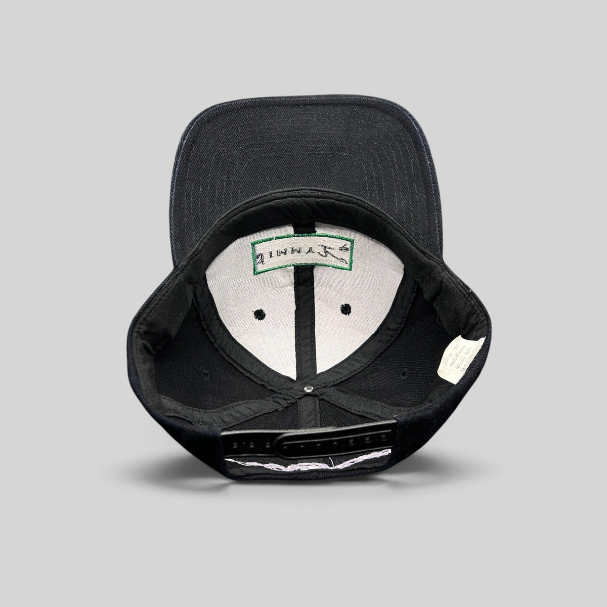 Raree Finds vintage Jimmy V charity snapback hat interior view showing embroidered quote on white cotton lining