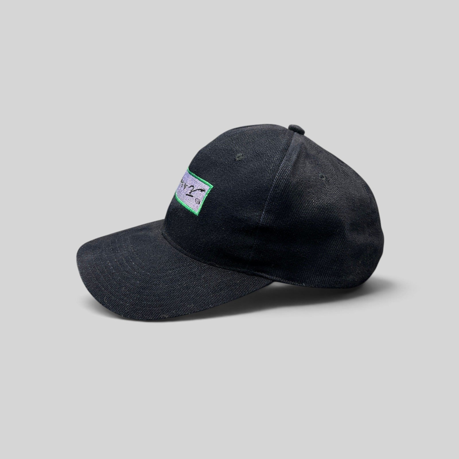 Raree Finds vintage black cotton snapback hat featuring a Jimmy V charity logo patch on the front