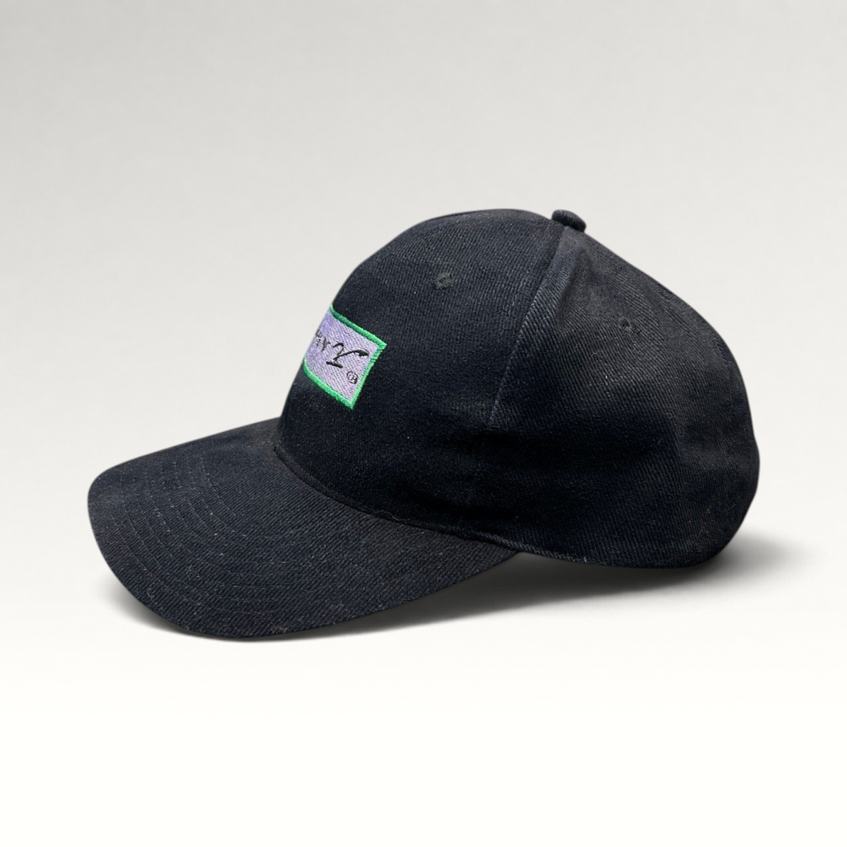 Raree Finds vintage black cotton snapback hat featuring a Jimmy V charity logo patch on the front