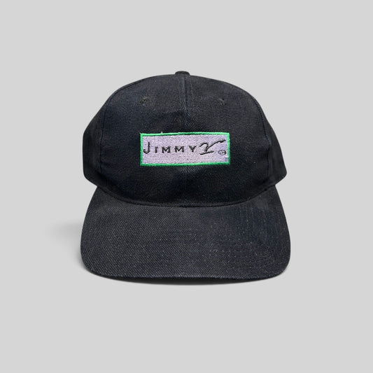 Raree Finds vintage black cotton snapback hat featuring an embroidered Jimmy V charity logo patch on the front.