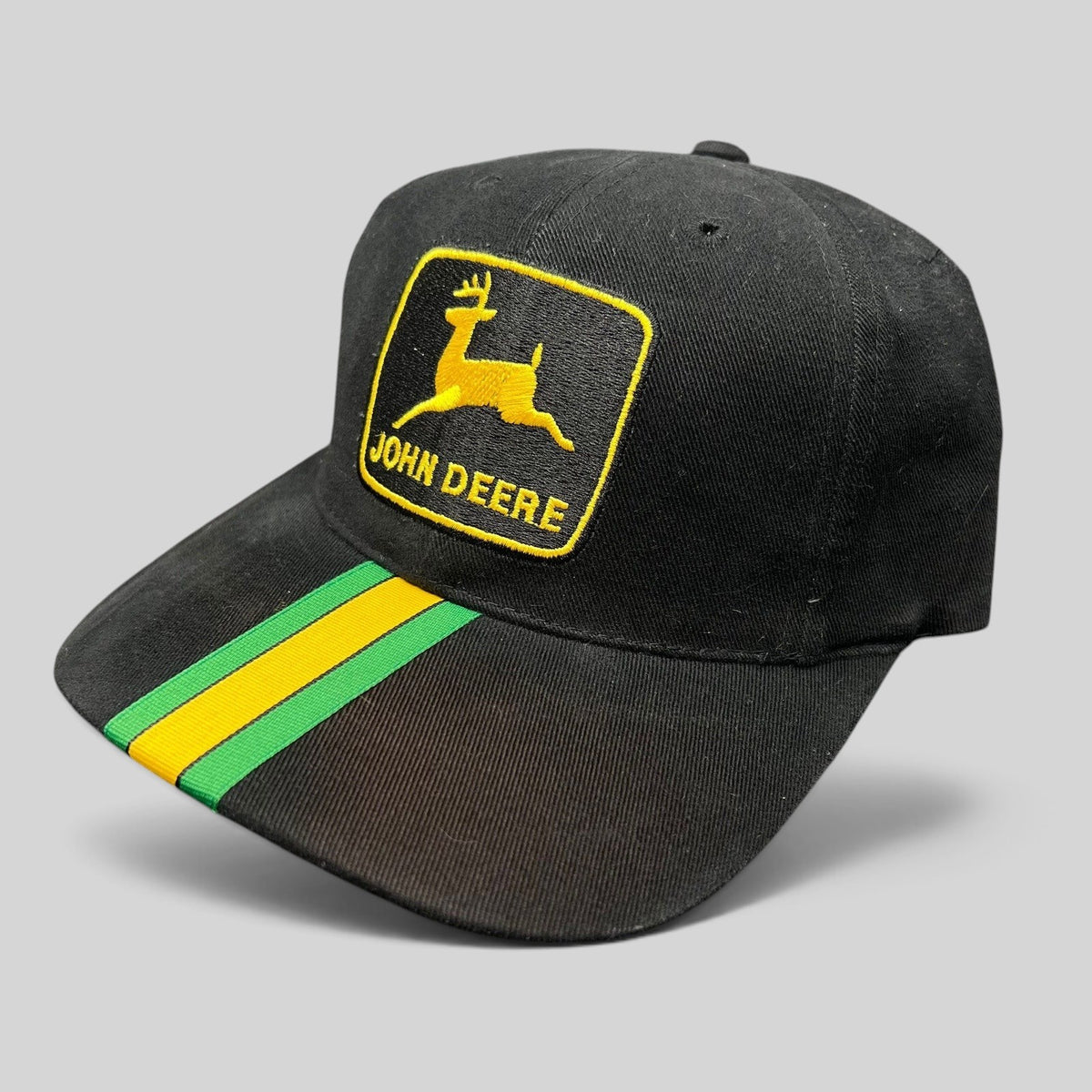 Raree Finds vintage black John Deere NASCAR strapback hat with yellow leaping deer logo and green yellow racing stripe