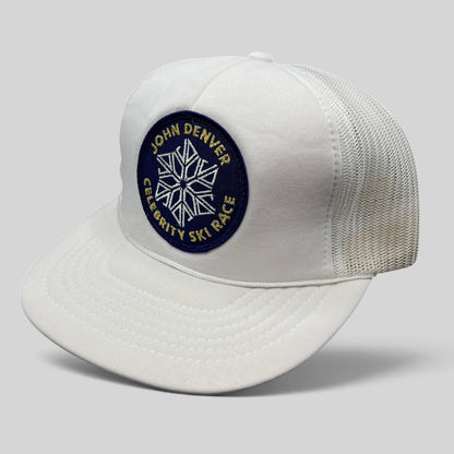 Raree Finds vintage 80s white foam trucker hat with John Denver Celebrity Ski Race snowflake patch and mesh back