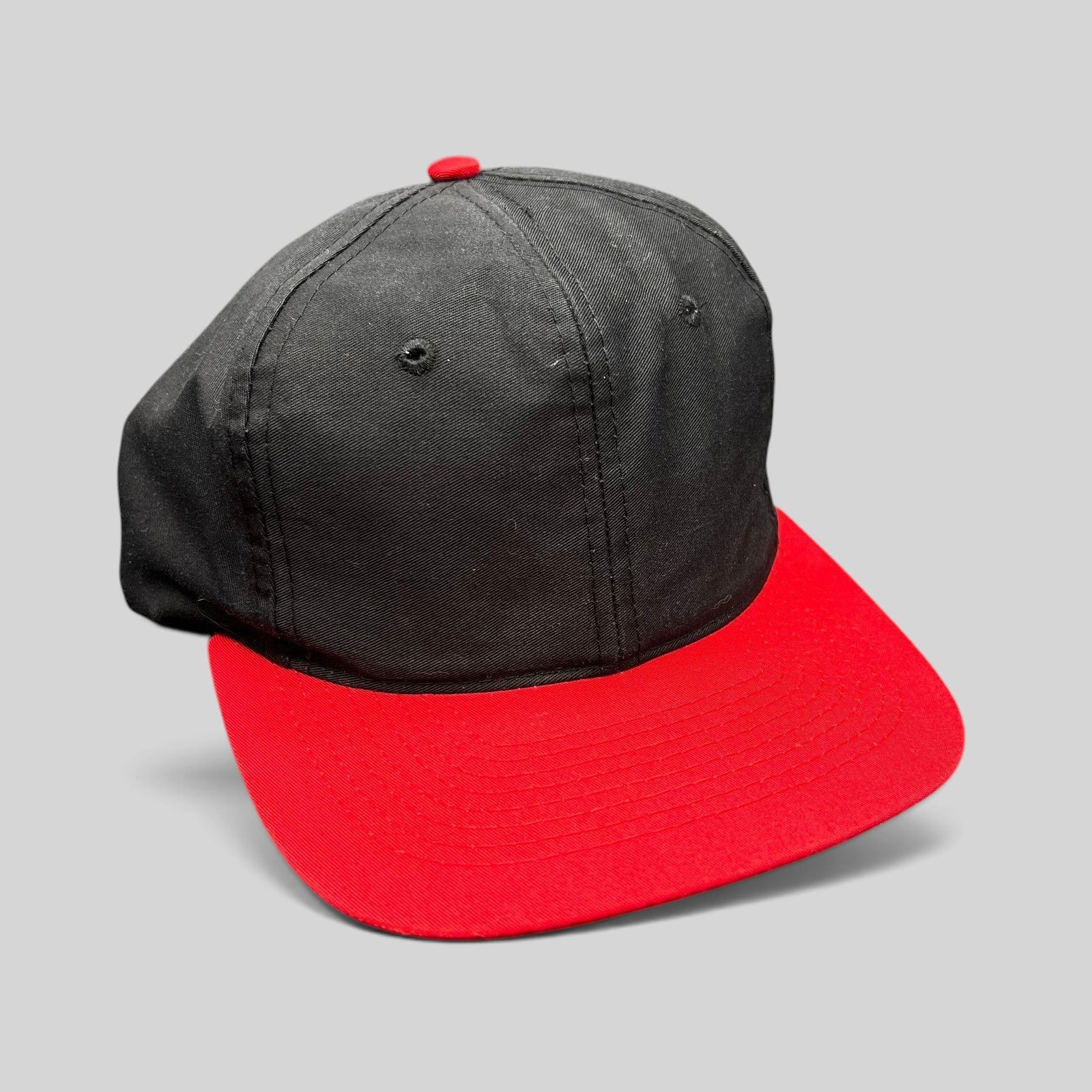 Raree Finds vintage 1992 Juice movie promo snapback hat with a black cotton crown and a red brim.